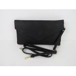 A black clutch purse 'as new', approx 31 x 17cm.