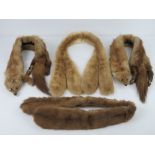 Four vintage fur collars.