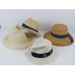 An Olney genuine panama hat size 71/8, together with a Wimbledon straw hat size large,