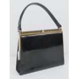 A vintage Jane Shilton black patent leather handbag 22 x 19cm.