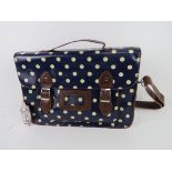 A blue polka dot satchel type handbag 'as new', approx 38 x 27cm.