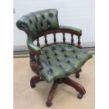 A good contemporary green leather button back reclining swivel office chair, studded throughout.