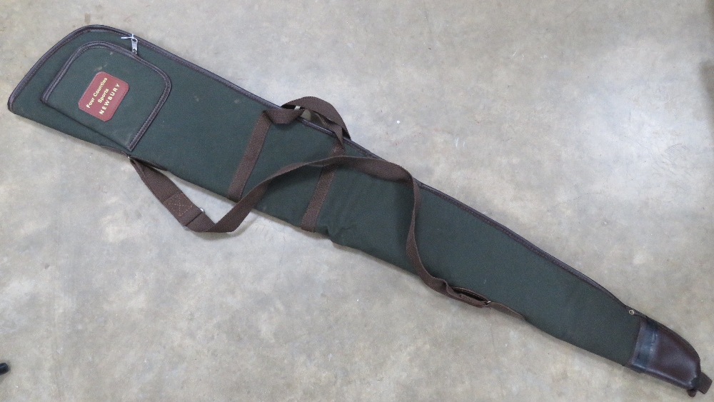 A fleece-lined canvas gun slip by Four Counties Sports Newbury, zip a/f.