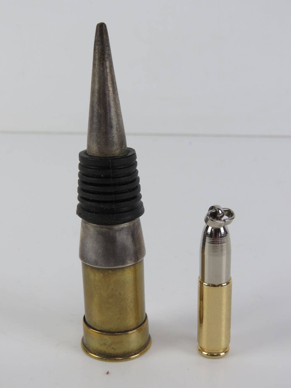 A wine stopper formed from a 12G cartridge case, 10cm,