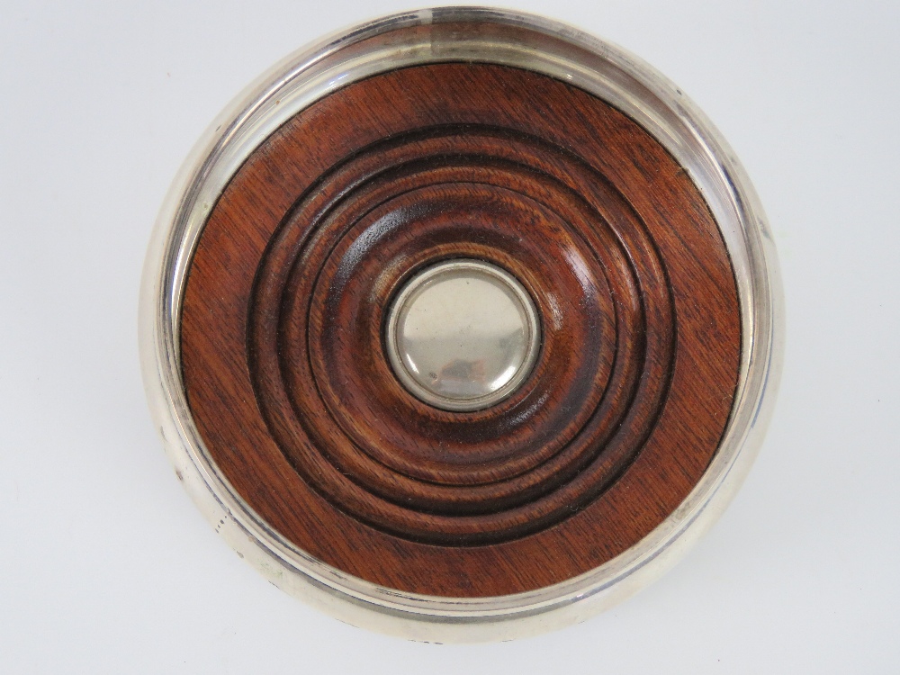 A HM silver wine coaster having green baize to turned wooden base, hallmarked for London, - Image 3 of 3