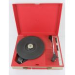 A Fidelity portable record player.