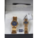 A 'His and Hers' stainless steel gents wristwatch and ladies wristwatch set, in presentation box.