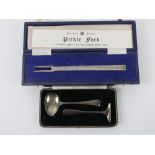 A HM silver pickle fork - a replica of the 'Manners' fork, the oldest English silver table fork,