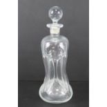 A Dartington decanter in the Victorian 'glug glug' style, standing 32cm high.