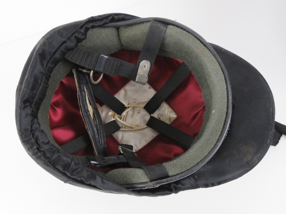 A contemporary riding helmet, 7 1/8, having red and white jockey silk. - Image 4 of 5