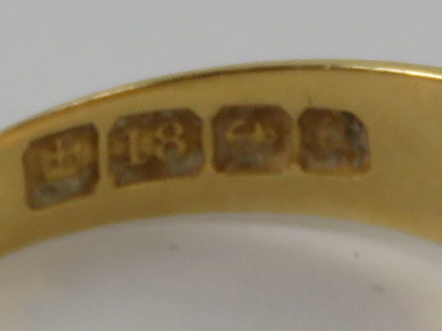 An 18ct gold 'gypsy' style ring having diamonds in star settings, central stone deficient, - Image 2 of 2