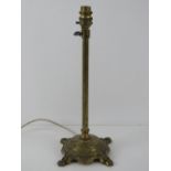 A brass table lamp base, adjustable height, tallest 57cm, shortest 38cm.