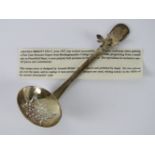 Amanda Birkett FSD-C (b1957); a HM silver sifter spoon having applied bee upon,