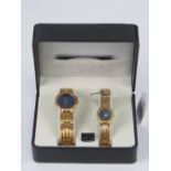 A 'His and Hers' stainless steel gents wristwatch and ladies wristwatch set, in presentation box.