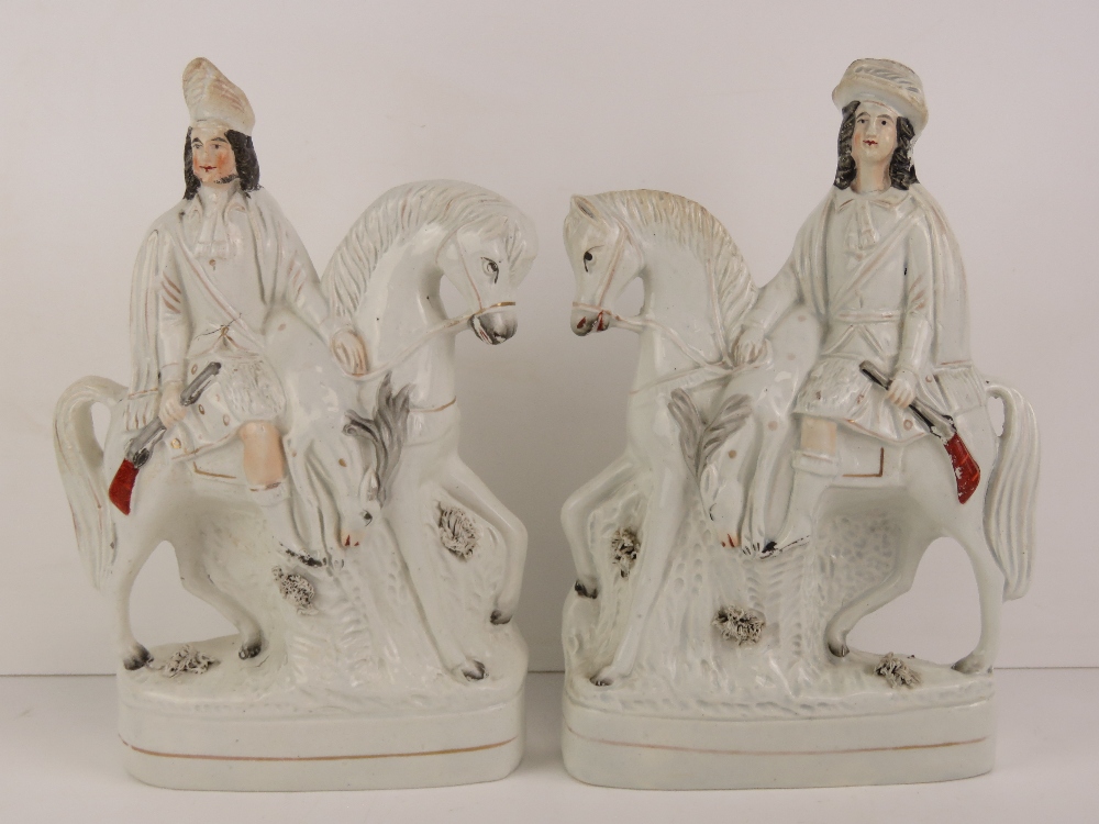 An opposing pair of Staffordshire flat back figurines each being a rider, musket in hand, - Image 3 of 4