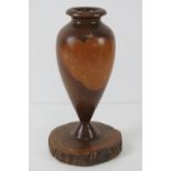 An Australian carved wooden vase,