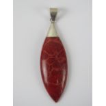 A 925 silver and red stone pendant, 6cm in length.