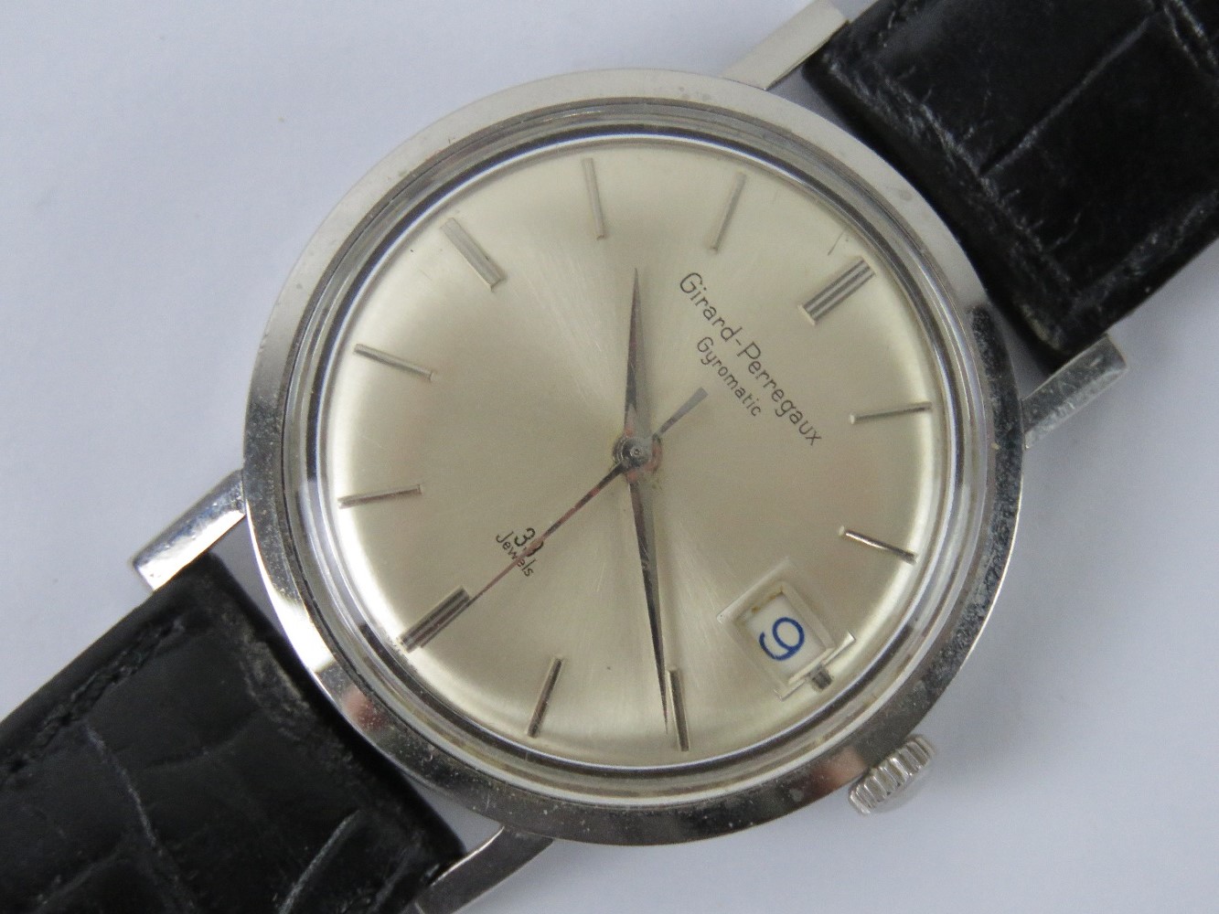 A Girard-Perregaux Gyromatic wristwatch on black leather faux crocodile skin strap,