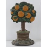 A heavy cast iron contemporary door stop in the form of an orange tree, 28cm high.