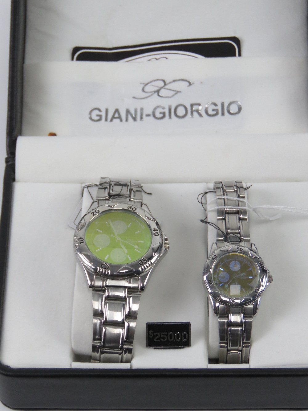 A 'His and Hers' stainless steel gents wristwatch and ladies wristwatch set, in presentation box.