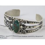 A Derrick Gordon Native American (Navajo) sterling silver bracelet set with Royston turquoise, 2.