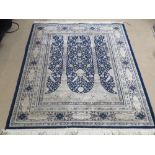 A silk rug in blue ground having Architectural design upon, 170 x 126cm.