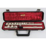 Flute: a silver plated Evette flute musical instrument, marked and case, no.