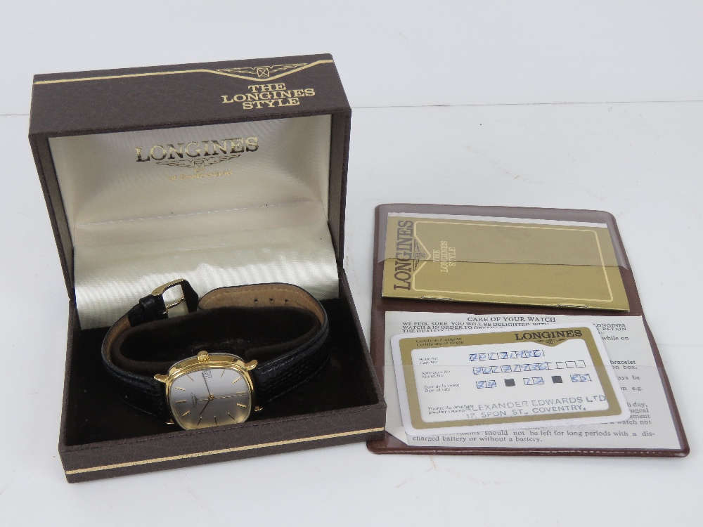 A c1980s Longines gold plated wristwatch on black reptile calf strap, with box and papers. - Image 6 of 6