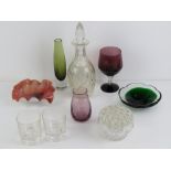 A cut glass decanter with stopper together with an ovalaid glass frilled dish,