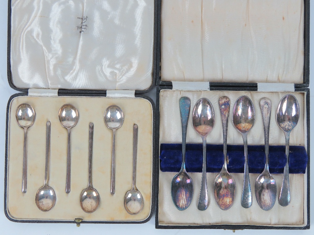 A set of six HM silver teaspoons in original fitted case, hallmarked Sheffield 1949.