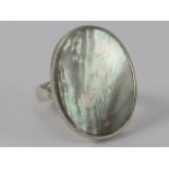 A silver and mother of pearl ring, stamped 925, size O-P, 2.9 x 2.3cm.