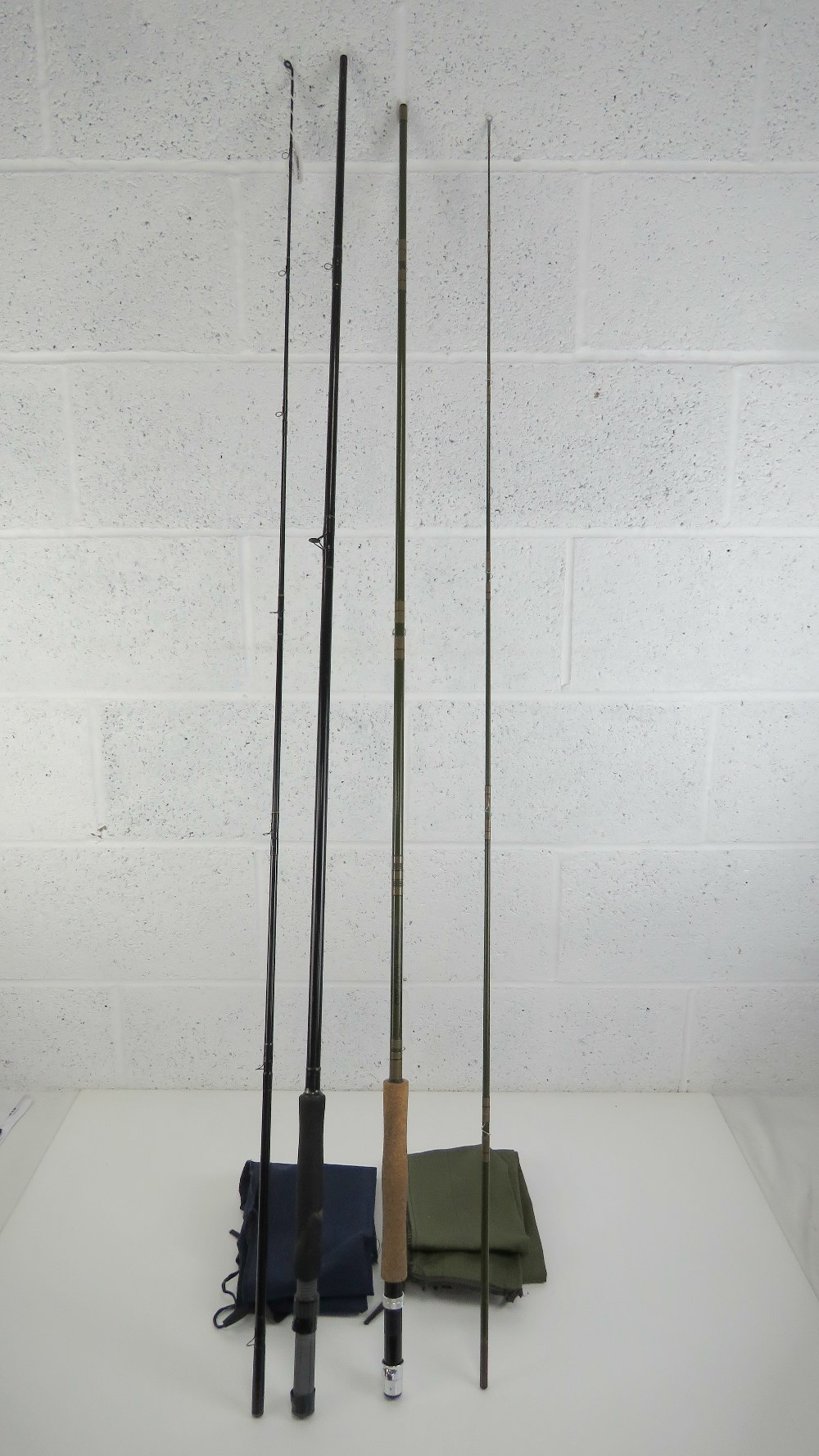 Two contemporary carbon fibre two sectional fly fishing rods, 290cm and 300cm respectively,