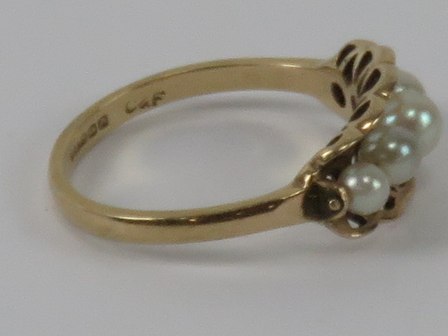 A 9ct gold and pearl ring, the basket setting holding five graduated pearls, hallmarked 375, 2.1g. - Image 2 of 2