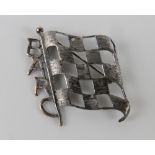 A silver BARC (British Automobile Racing Club) badge featuring 'chequered flag', stamped silver,