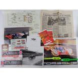 A quantity of assorted automobilia including printed drawings of a 2012 HP car,