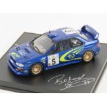 A Trofeu miniature Subaru Impreza Burns/Reid racing car signed by both drivers,