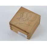 A tongue and groove Honda Legend wooden box, signed to the base Nigel Mansell.