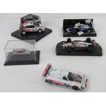 A quantity of model cars including 1:43 scale Ford Focus WRC (Colin McRae) 416 of 5000,