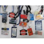 An assortment of twelve motor racing lanyards including Ferrari Owners Club, British Grand Prix,