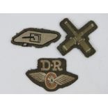 Three assorted WWII British cloth badges