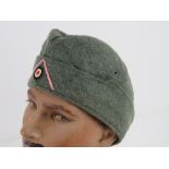 A WWII German Panzer side cap, size 58.