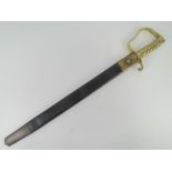 A British 1856 pattern Pioneer sword with saw back blade measuring 57cm in length,