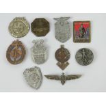 A quantity of assorted WWII German day badges including; N.S.D.A.