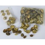 A large quantity of Navy and RAF brass buttons.