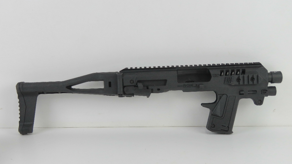 A Micro Roni conversion system for the Glock 19 and Glock 23. CAA manufacture and 'as new' in box. - Image 3 of 6