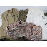 A German top, Navy shirt and trousers, also an army shirt and fleece, water bottle, army side cap,