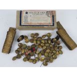 A quantity of gold braids Navy brass buttons and medal ribbons contained within a Gieves box having