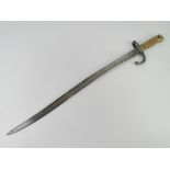 A French 1867 model Chassepot Yataghan bayonet engraved and dated St Etienne...