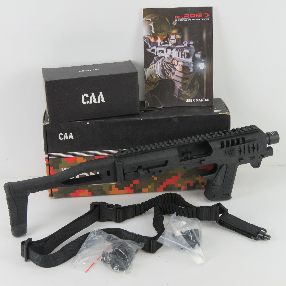 A Micro Roni conversion system for the Glock 19 and Glock 23. CAA manufacture and 'as new' in box.