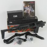A Micro Roni conversion system for the Glock 19 and Glock 23. CAA manufacture and 'as new' in box.
